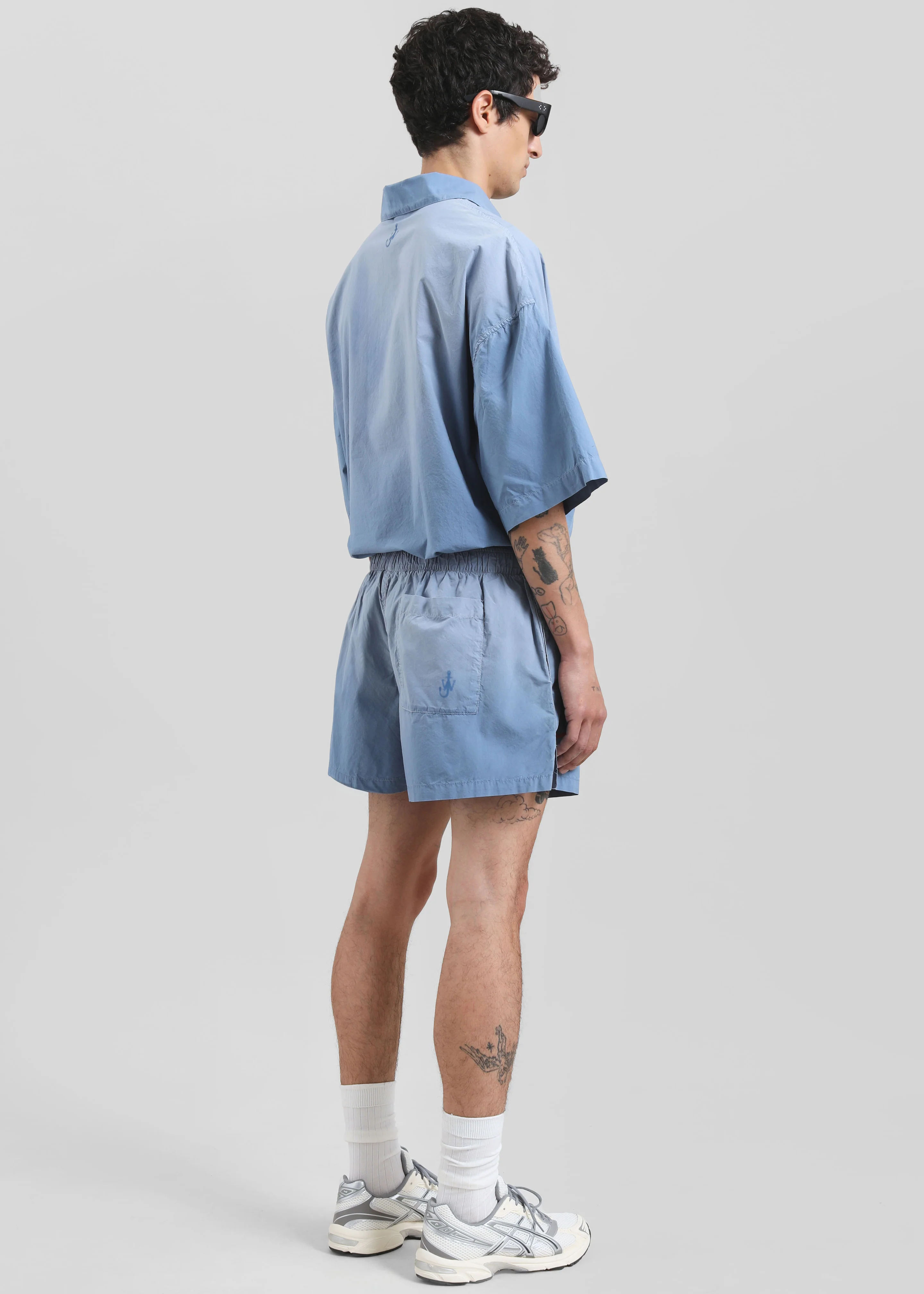 JW Anderson Logo Print Shorts - Light Blue - Image 7